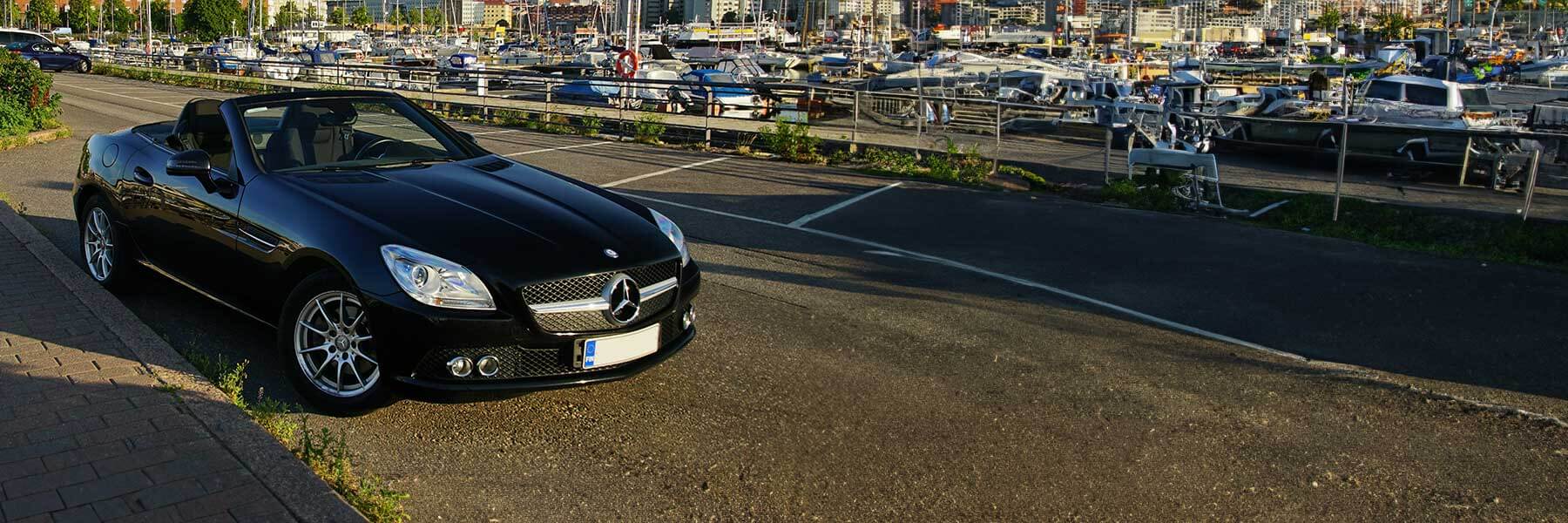 Featured banner showcasing the Mercedes SLK with original Mercedes wheels.
