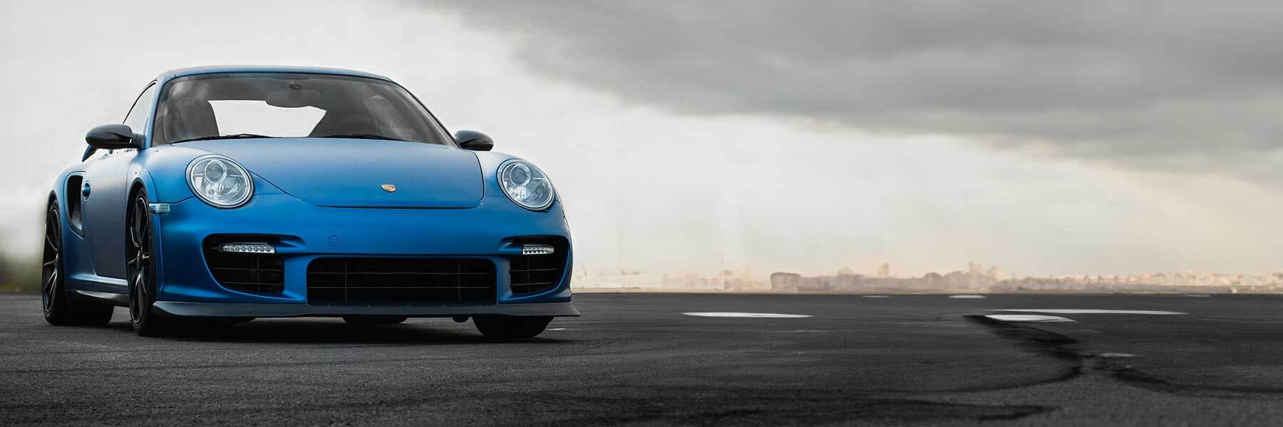 Featured banner showcasing the Porsche 997 (911) with original Porsche wheels.