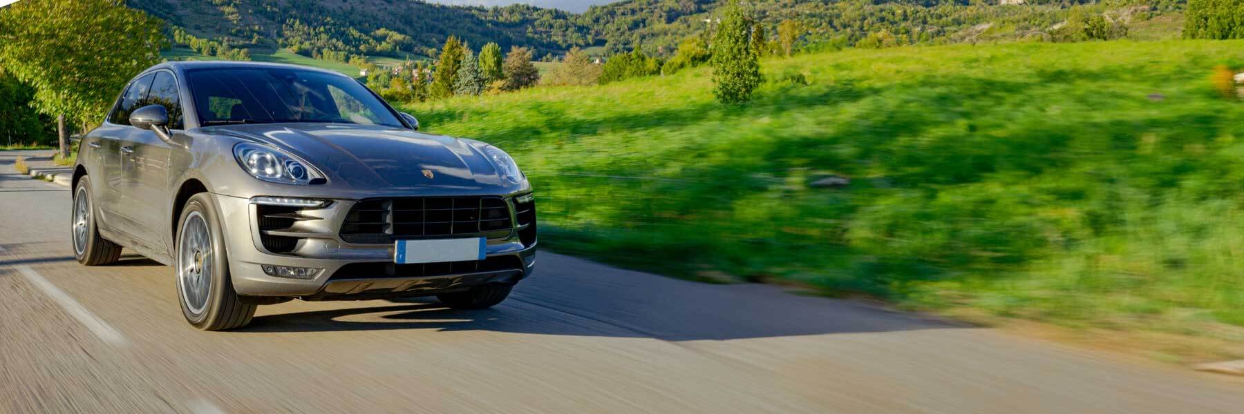 Featured banner showcasing the Porsche Macan with original Porsche wheels.