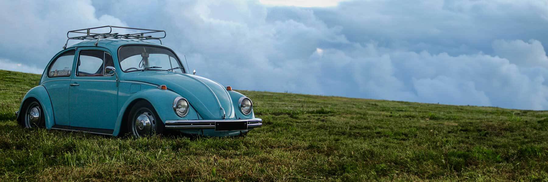 Banner image of a  VW Beetle 1Y featuring original VW wheels.