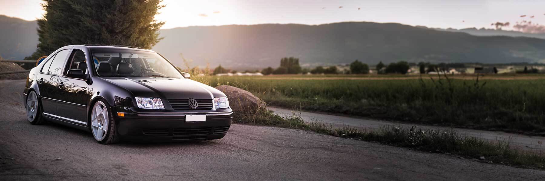 Featured banner showcasing the VW Jetta with original VW wheels.