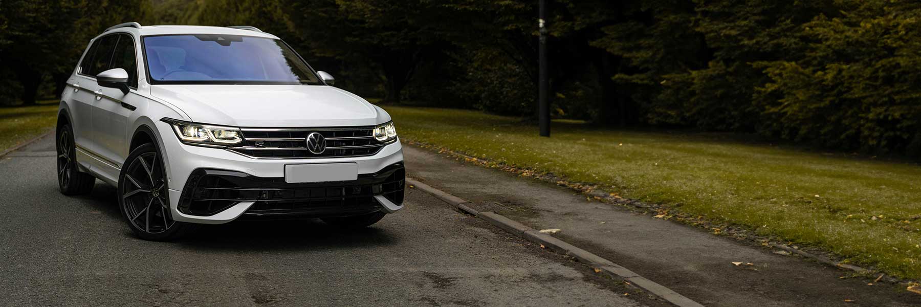 Banner image of a  VW Tiguan 5N featuring original VW wheels.