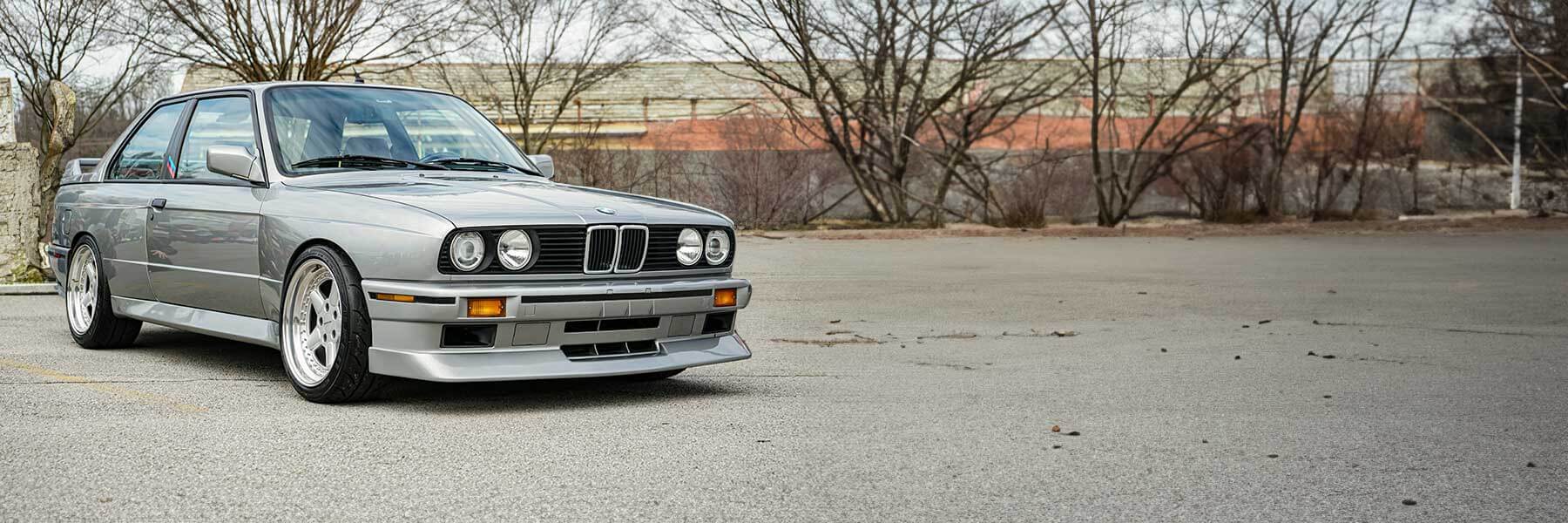 Banner image of vehicle featuring genuine AC Schnitzer alloy wheels.
