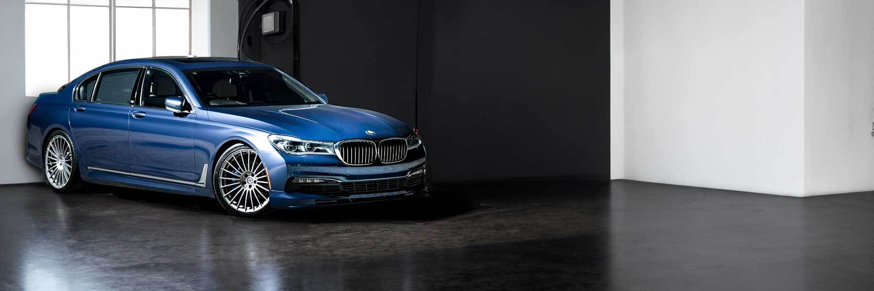 Banner image of vehicle featuring genuine Alpina alloy wheels.