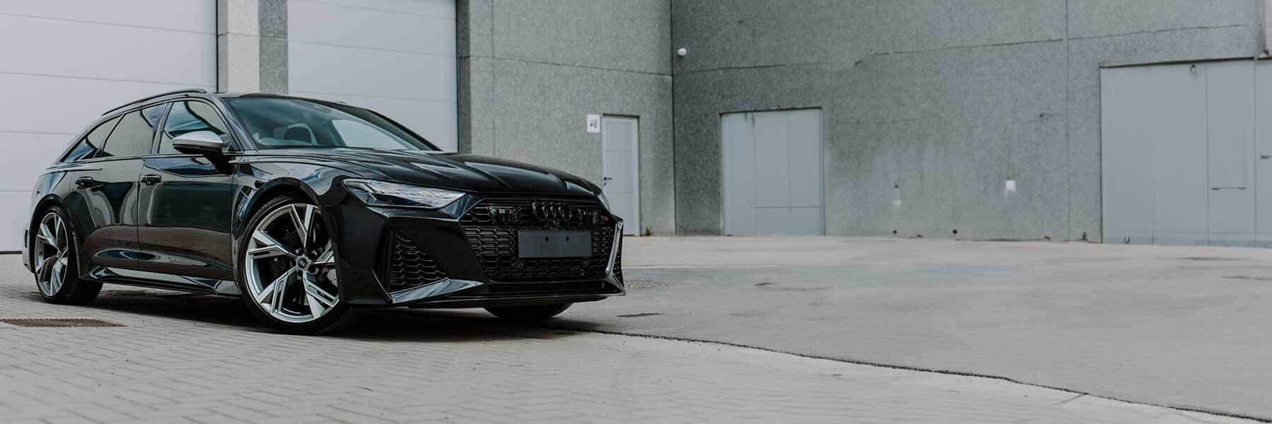 Banner image of vehicle featuring genuine Audi alloy wheels.