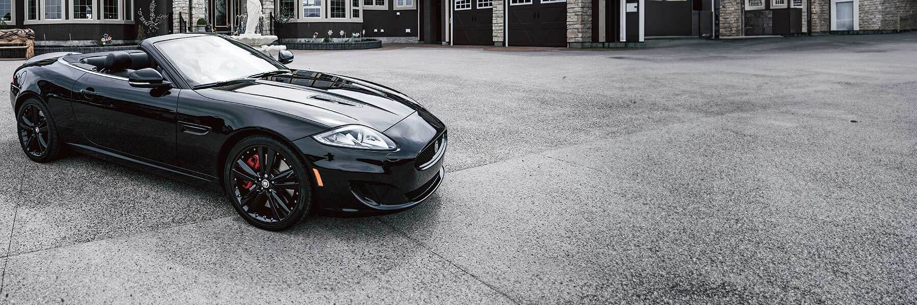 Banner image of vehicle featuring genuine Jaguar alloy wheels.