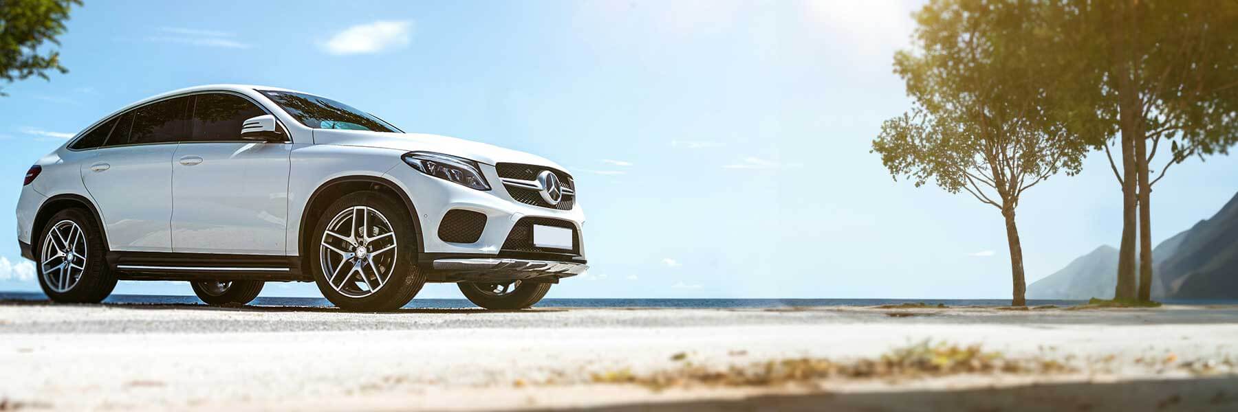 Banner image of vehicle featuring genuine Mercedes alloy wheels.