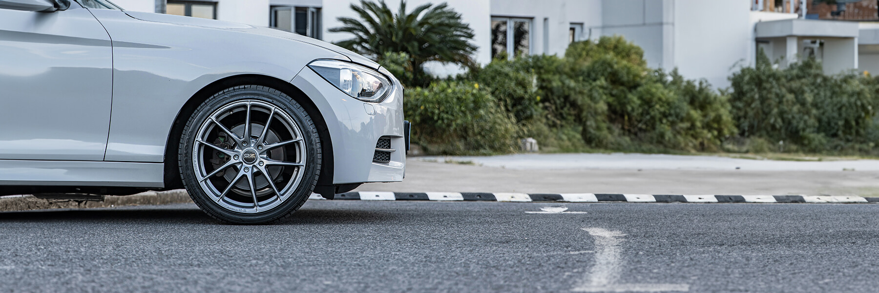 Banner image of vehicle featuring genuine OZ Racing alloy wheels.